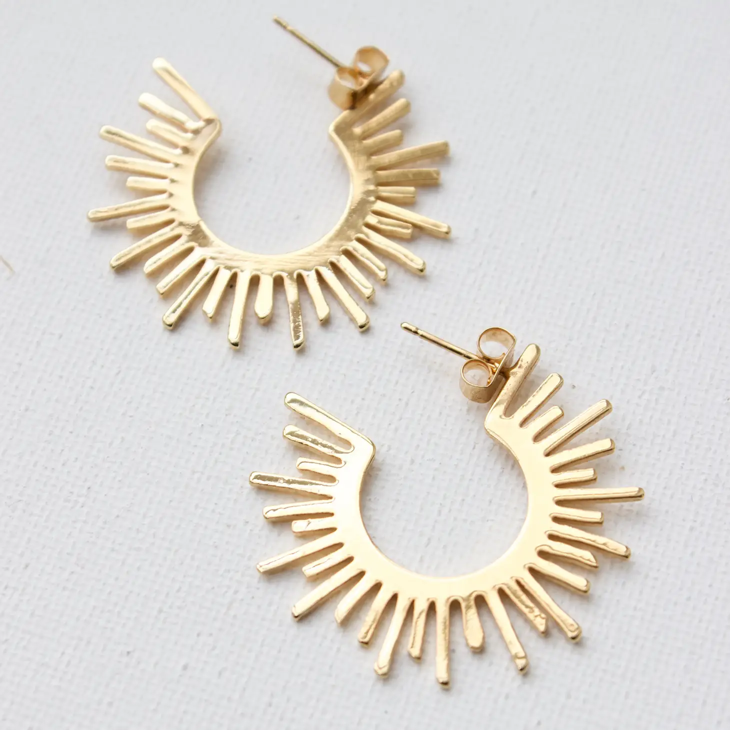 Buy Earrings Amina Muaddi Cameron hoop large sun (CAMERON HOOP LARGE) |  Luxury online store First Boutique